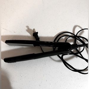 Revlon flat iron great condition. I have way too many and my hair is short